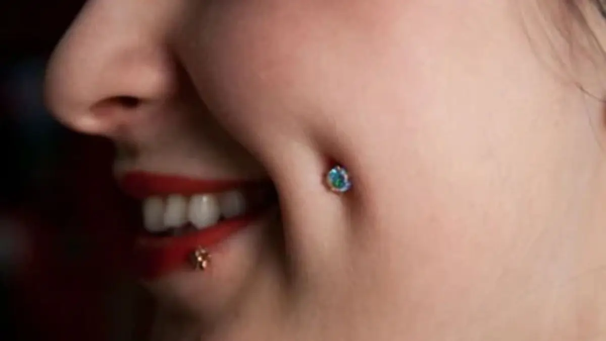 cheek dimple piercing_